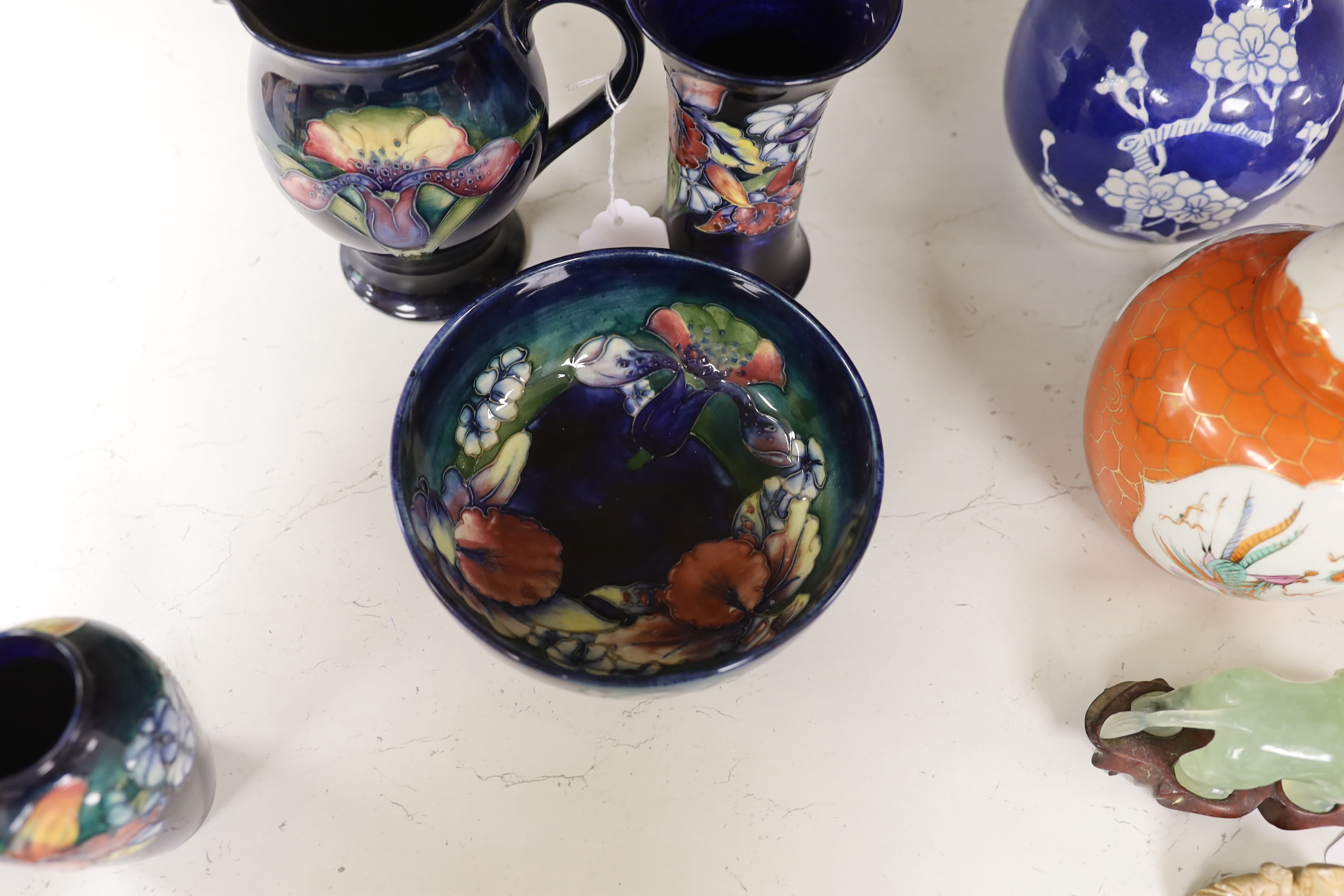 Four pieces of Moorcroft pottery, tallest 15cm